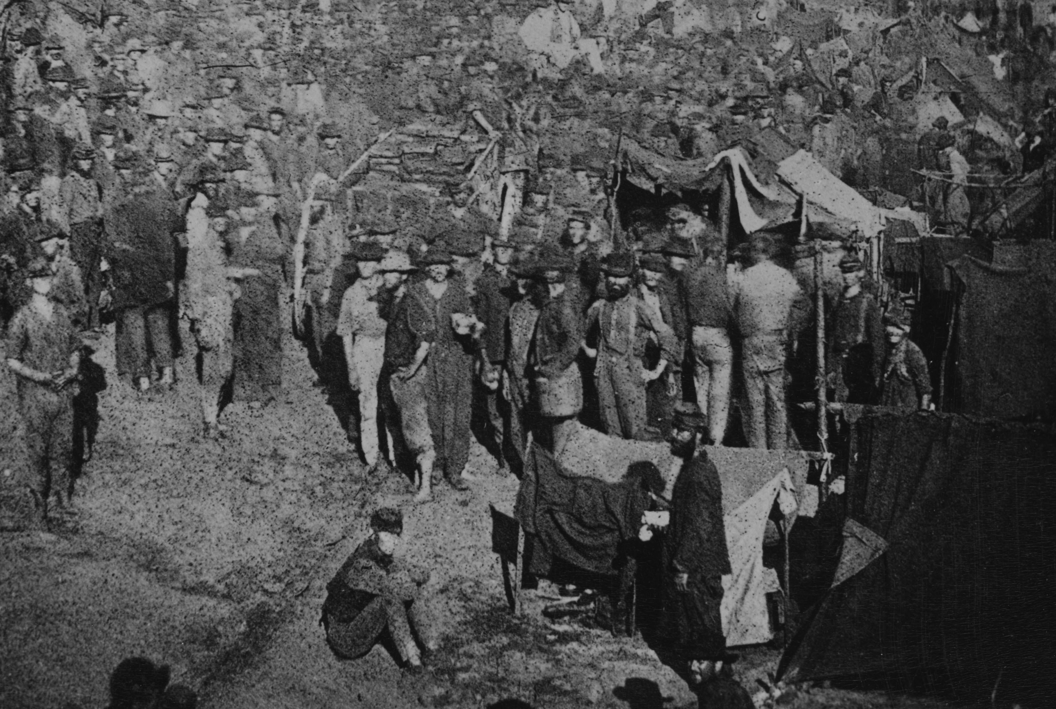 AndersonvillePrisonersGetRationsCroppedJPEG.jpg